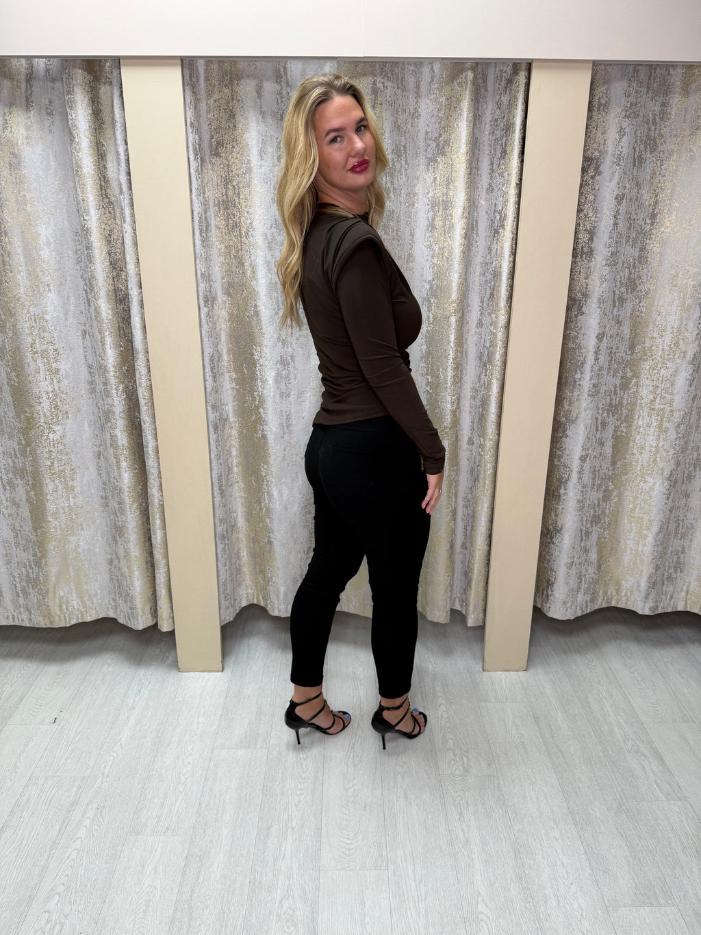 Asymmetric Side Split Long Sleeve Buckle Top with Shoulder Pads & Ruched Detailing