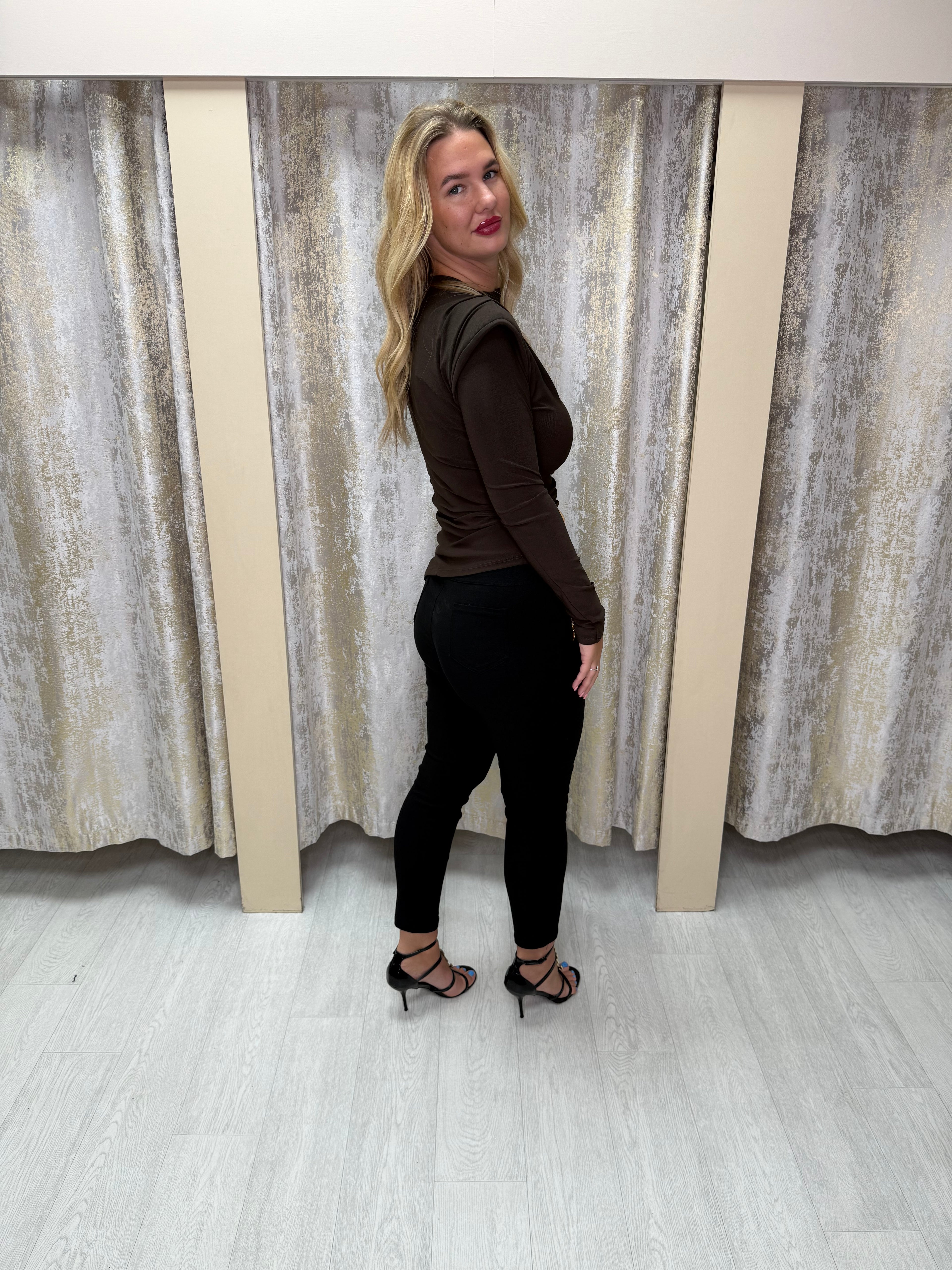 Asymmetric Side Split Long Sleeve Buckle Top with Shoulder Pads & Ruched Detailing